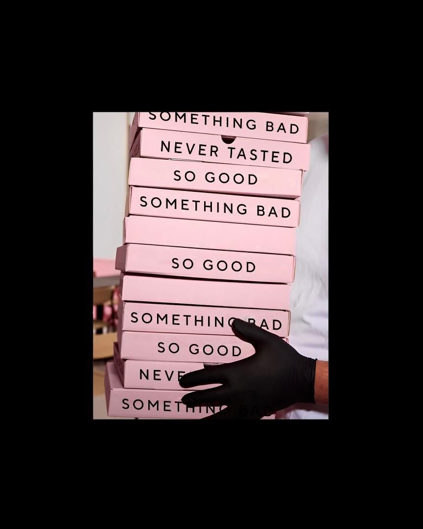 Pila de cajas rosas con el mensaje Never Tasted So Good Something Bad
